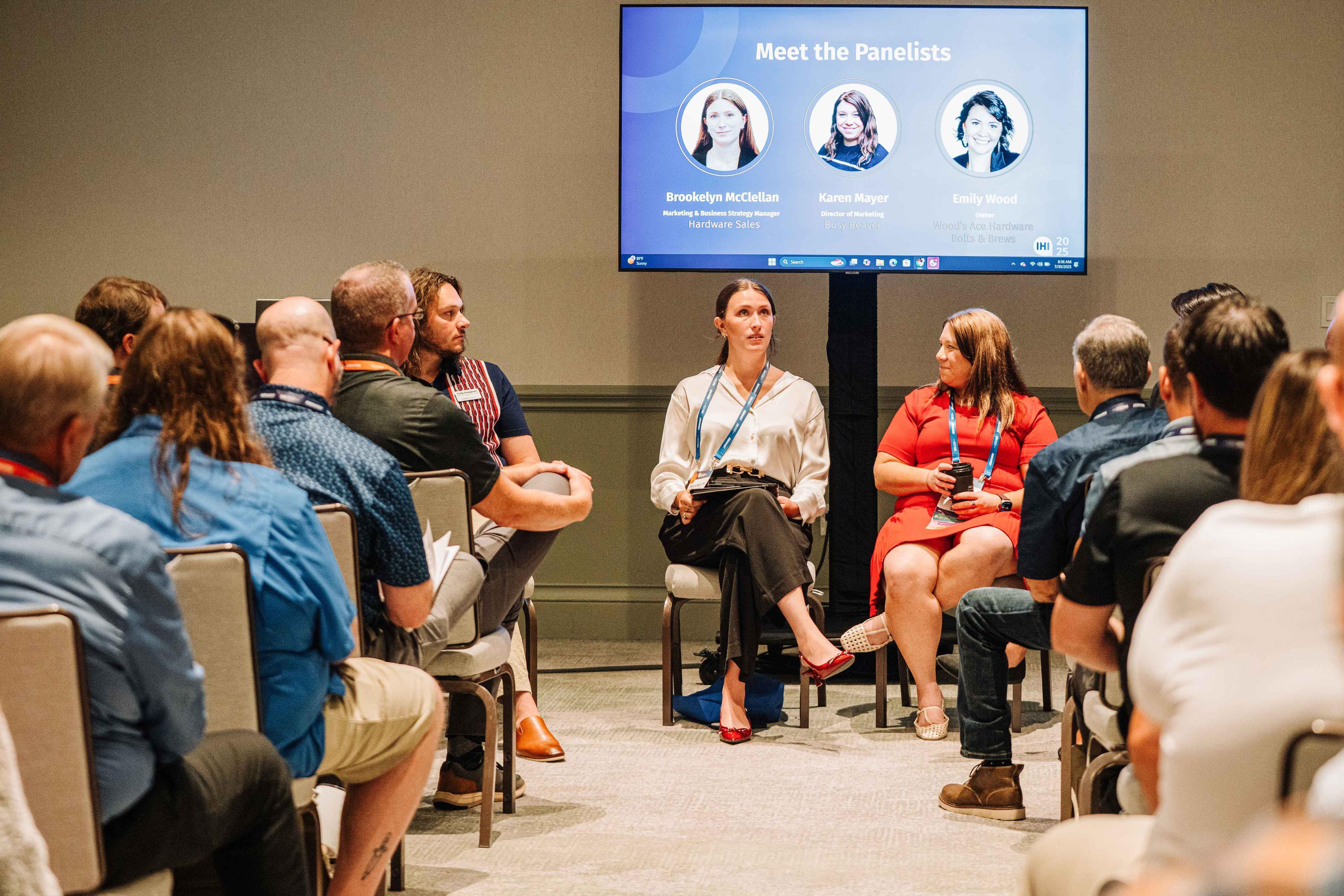 Retailers listen attend a panel educational breakout session.